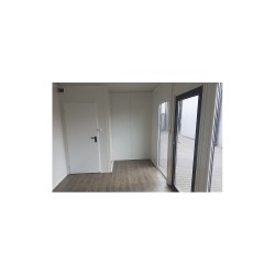Contenedor de oficina de 18 m2 con aseos