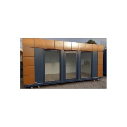 Contenedor de oficina de 18 m2 con aseos